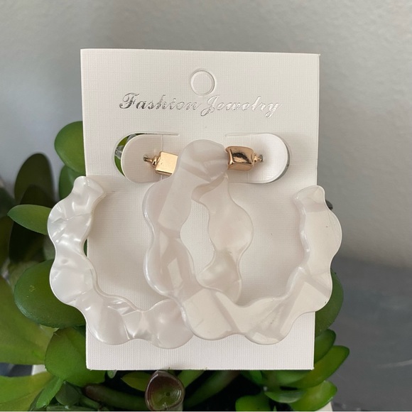 SOLD White Acrylic Circle Earrings - Picture 3 of 4